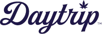 Script font Daytrip logo in navy blue on a white background. A leaf dots the i in Daytrip.