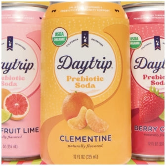 A close up front view render of the three flavors in the Daytrip prebiotic soda lineup.